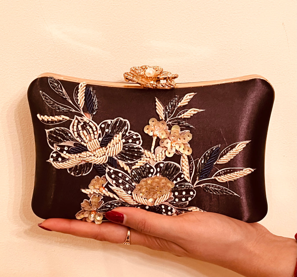 The Lyra Iconic Clutch