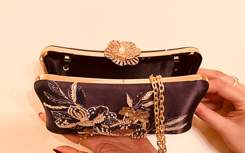 The Lyra Iconic Clutch