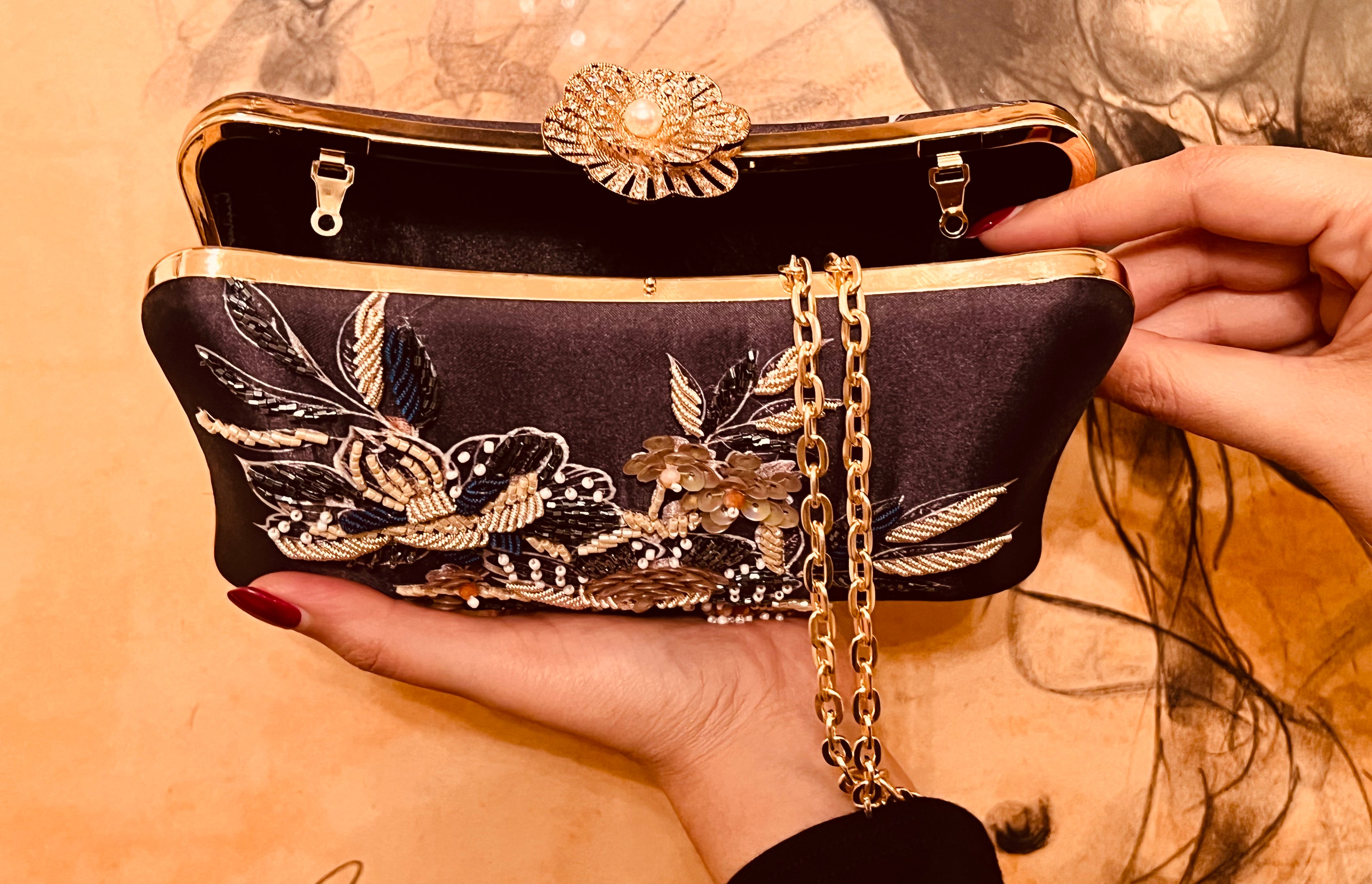 The Lyra Iconic Clutch