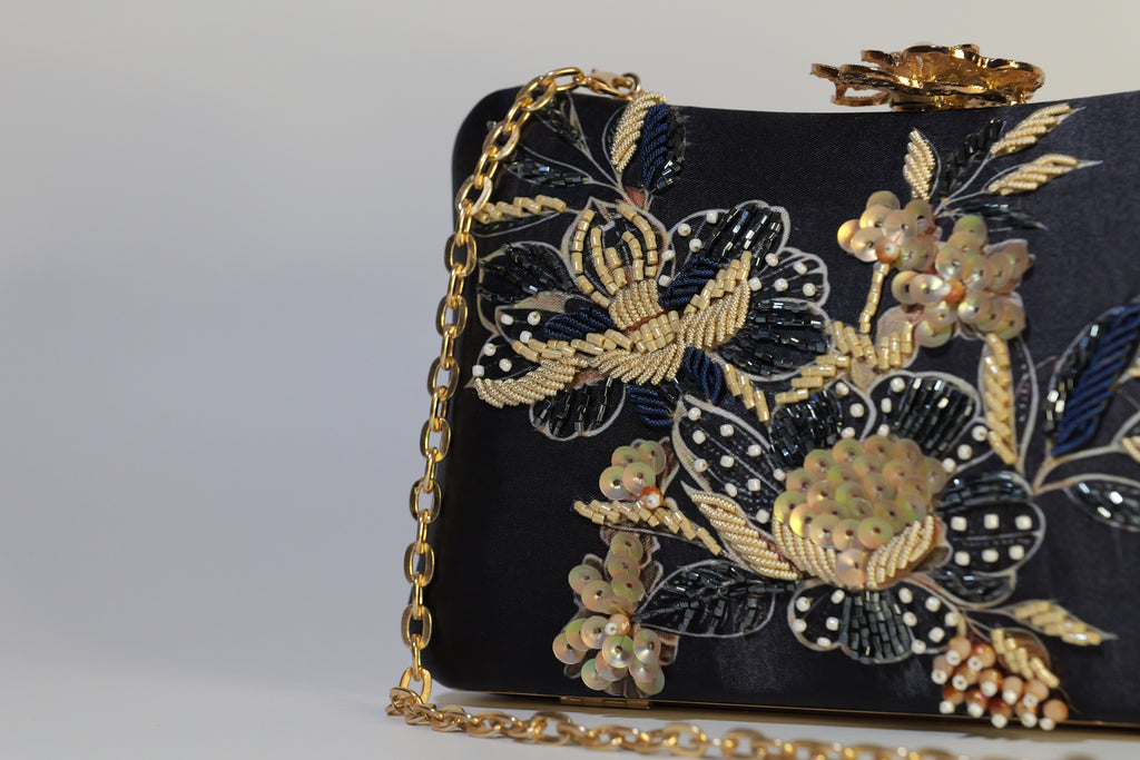 The Lyra Iconic Clutch