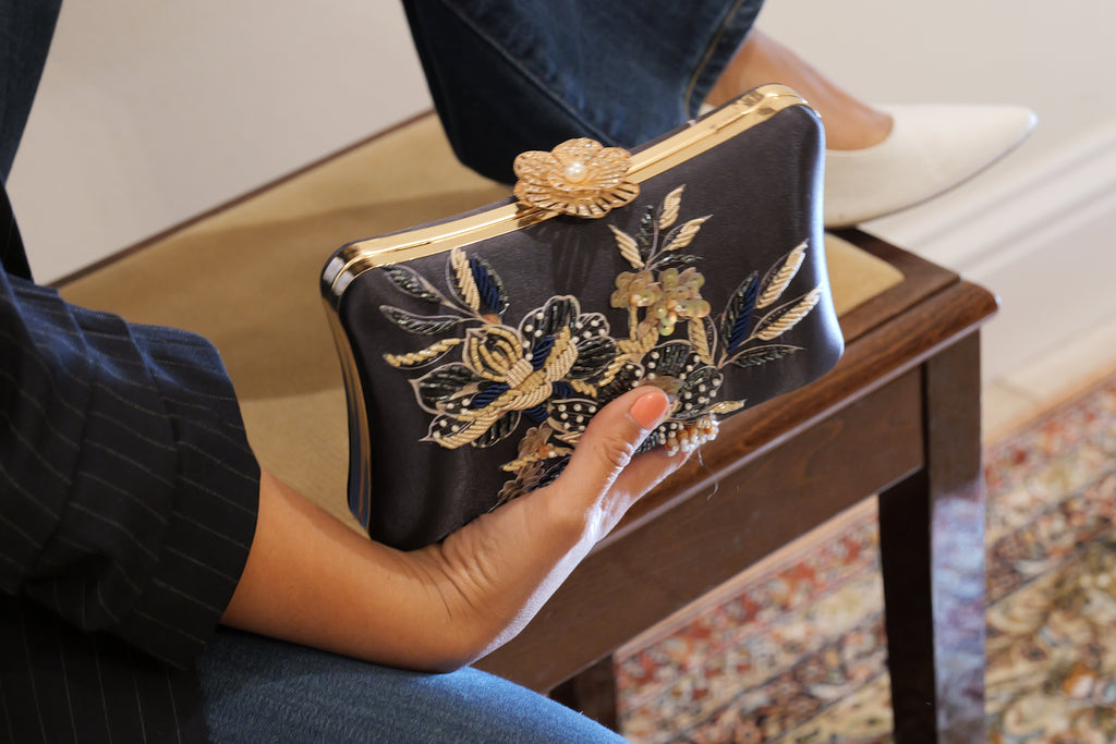 The Lyra Iconic Clutch